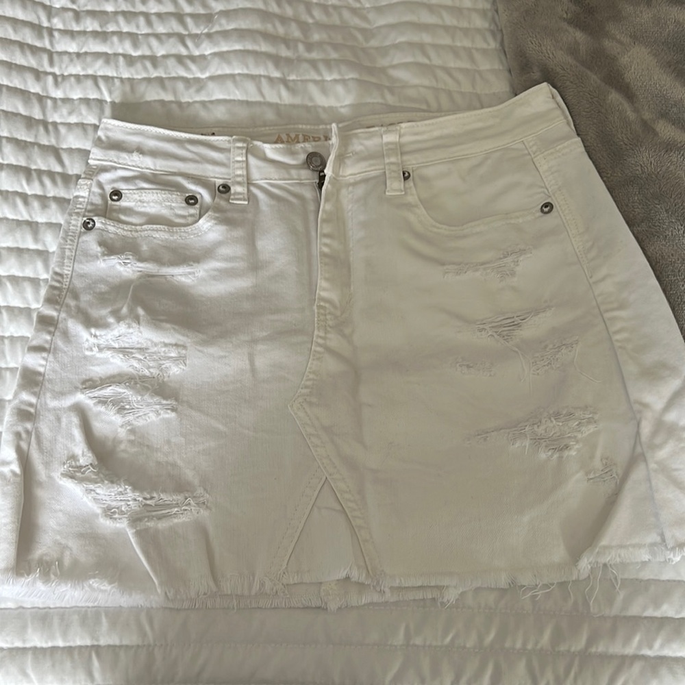 White jean mini skirt.